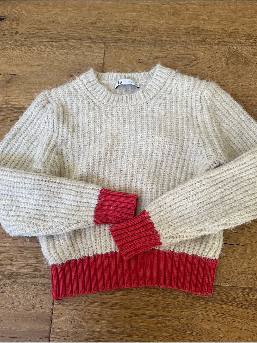 Cozy Cream Knit Sweater with Red Jo Trim